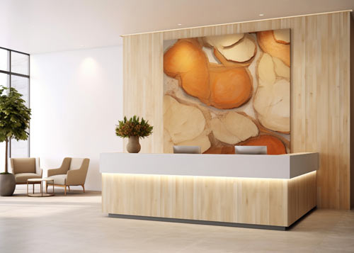 Reception desk fit-out by Blueprint Experts – wooden counter with artistic wall design and warm lighting.