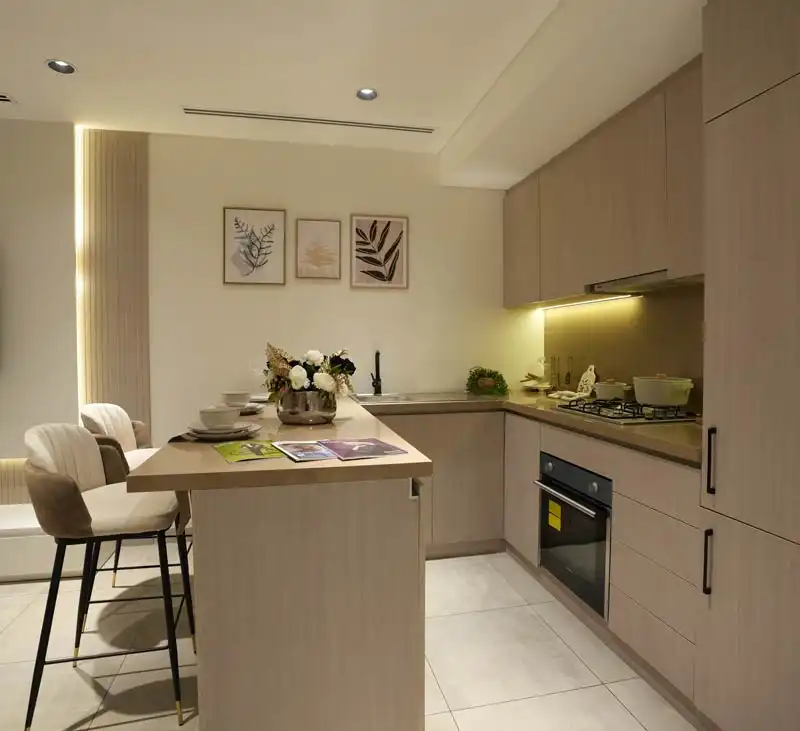 Apartment living room with TV, beige curtains, and comfortable seating by Blueprint Experts