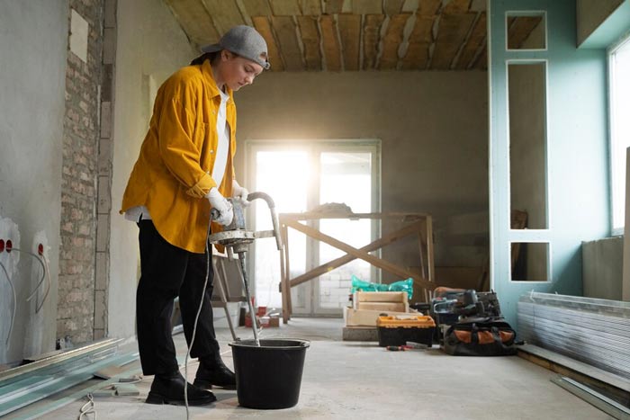 Why Hiring a Professional Fit Out Contractor in Dubai Saves Time & Cost 1 tiler working home renovation