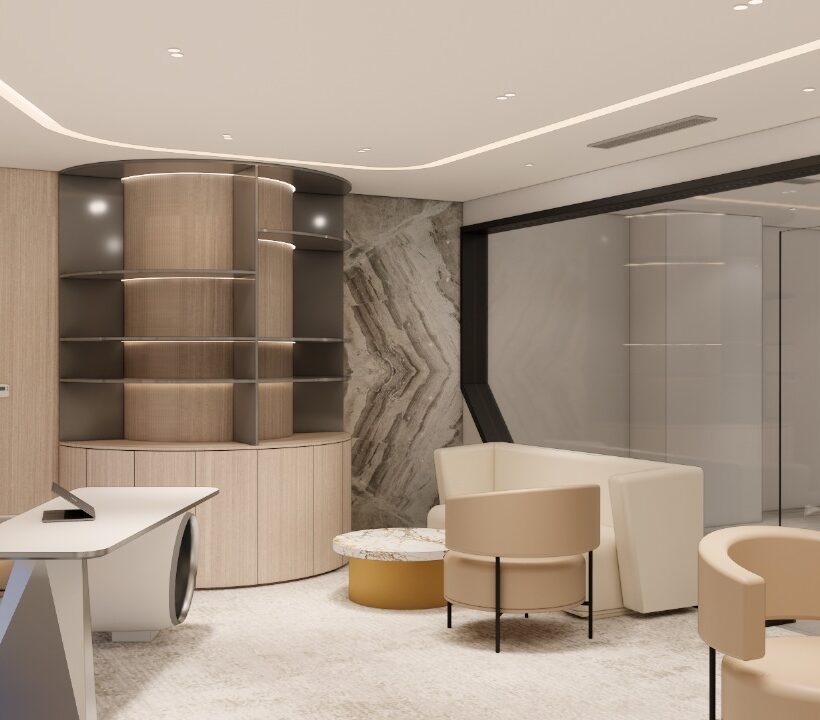 Executive office interior fit out with custom desk, modern seating, marble feature wall and bespoke shelving by Blueprint Experts Dubai