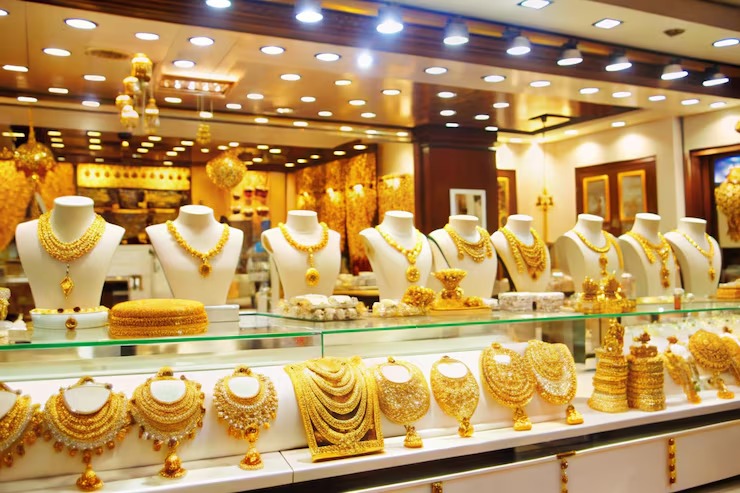 Luxury restaurant interior fit-out by Blueprint Experts – upscale dining space with chandeliers, wooden beams, and designer furniture.