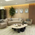 Modern corporate lounge interior fit out with bespoke furniture, wall paneling and reception seating by Blueprint Experts Dubai