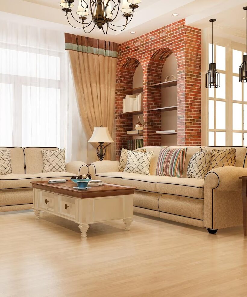 Warm and cozy living room featuring comfortable seating, decorative accents, and soft ambient light