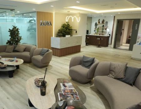 Interior fit out for stylish lounge area with custom seating, center tables and warm contemporary décor by Blueprint Experts UAE